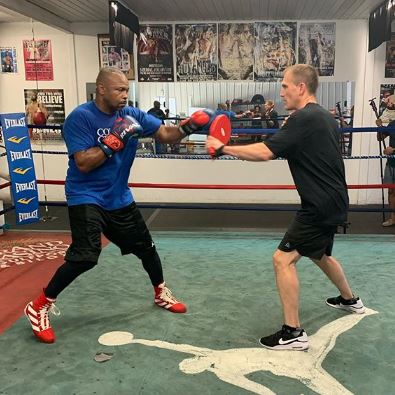 Jones Jr training on the pads with Tom Yankello