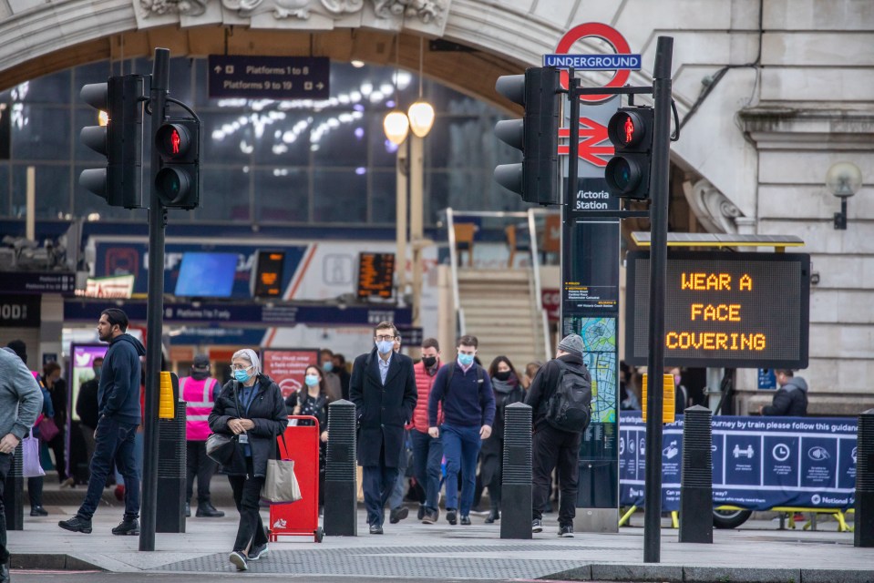 Commuters head out to work - as London's mayor warns the capital will likely face stronger shutdown laws in just days