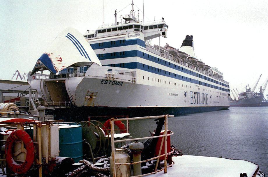 The official story was that the bow door, seen raised here, was ripped off by powerful waves, catastrophically flooding the car deck