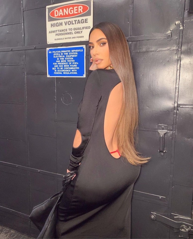 Kim posed for a sultry photo in a hallway after Matthew sent her the gown