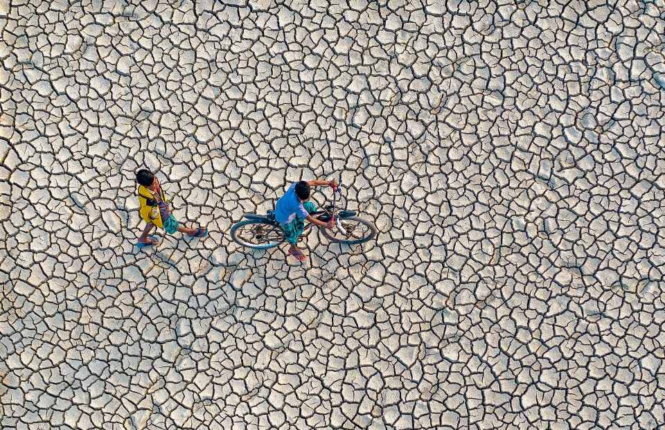 A Thirsty Earth by Abdul Momin, taken in Chittagong, Bangladesh showing the cracking land during an intense drought in the area