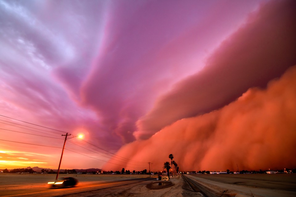 Tina Wright captured this unbelievable electric pink and red dust storm in Arizona