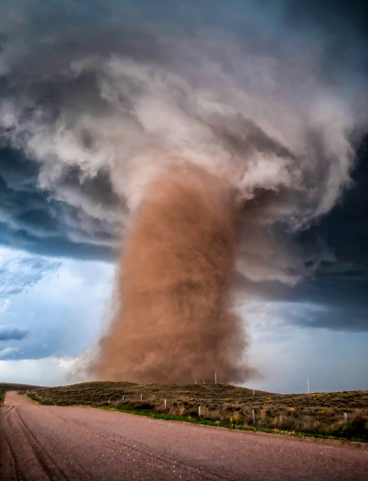 An incredible tornado tearing through a rural Colorado field after destroying a home, captured by Tori Jane Ostberg