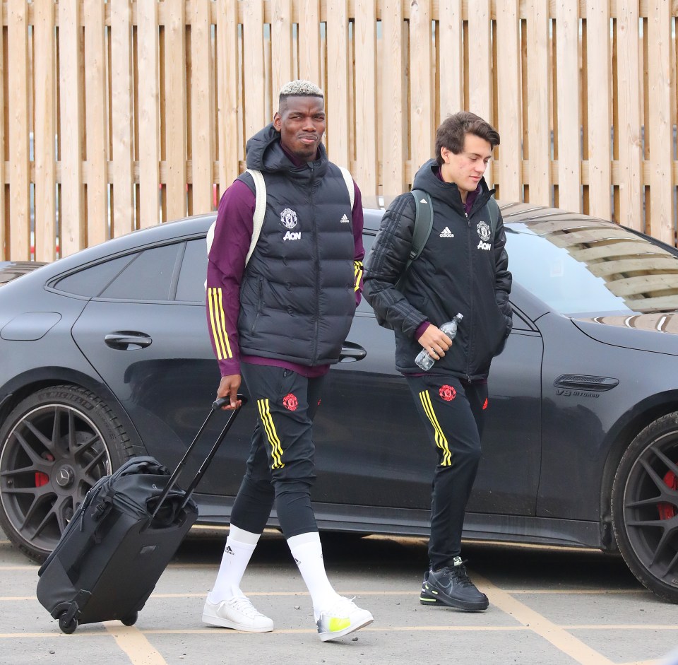 Paul Pogba was also spotted arriving at the airport on Monday afternoon