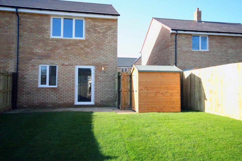 The lounge opens onto a decent-sized back garden