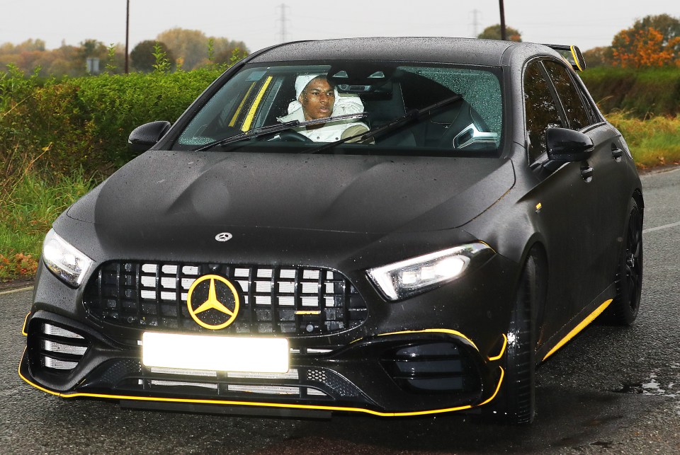 The football star arriving at the AON Carrington Training Complex on Friday morning