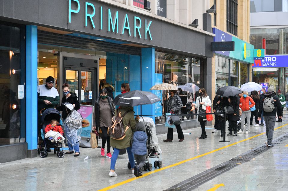 Despite the rain, shoppers formed long queues outside Primark