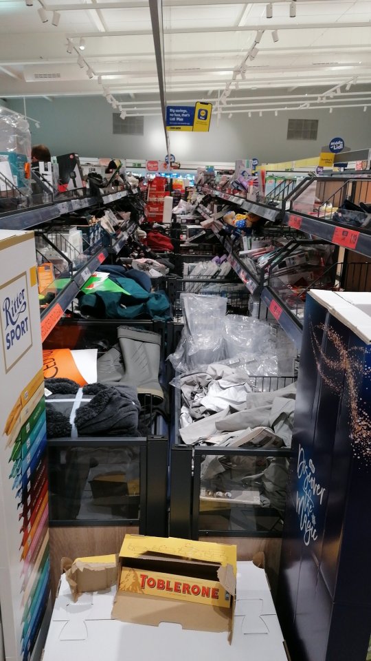 The central aisle at one Lidl was closed off - as goods sold there aren't deemed to be essential