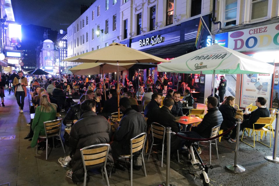 Londoners are seen out in Soho last night