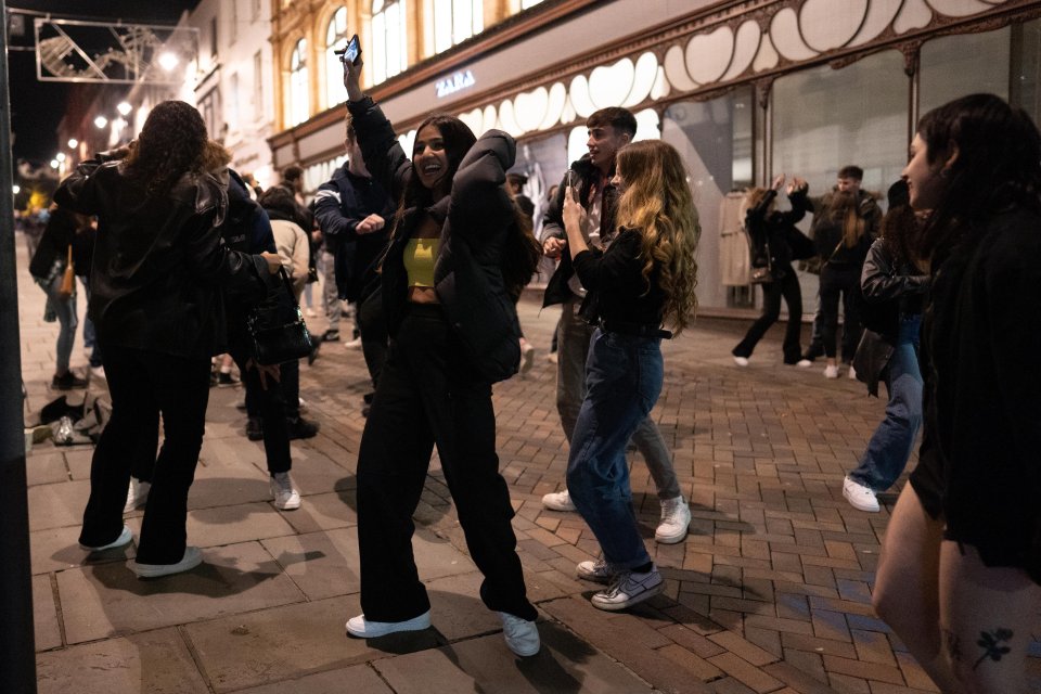 Revellers take to the streets after pubs closed at 10pm in Nottingham