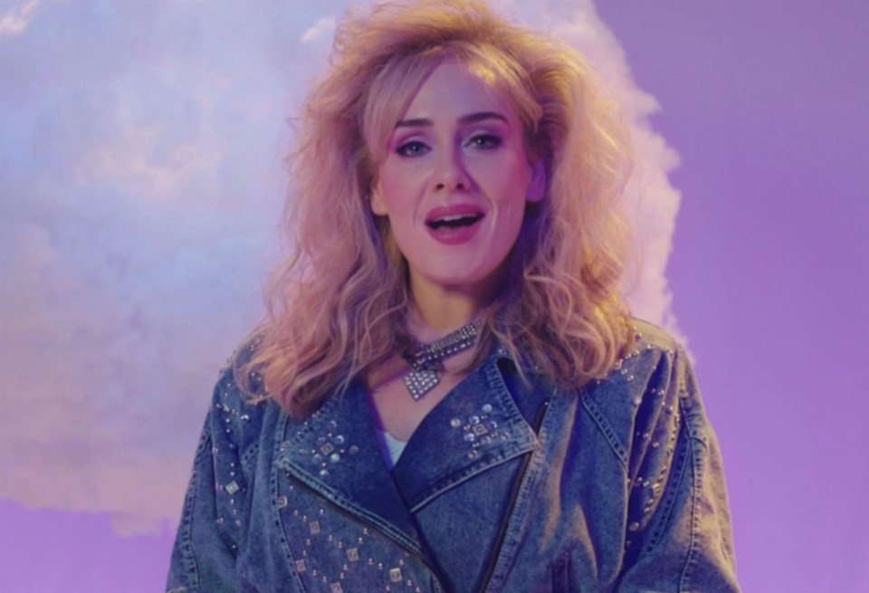 Adele spoofs an OTT ’80s advert with big hair