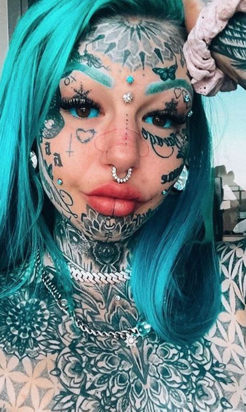 ‘Dragon girl’ Amber Luke, 25, has revealed what she looked like before covering 98% of her body in tattoos