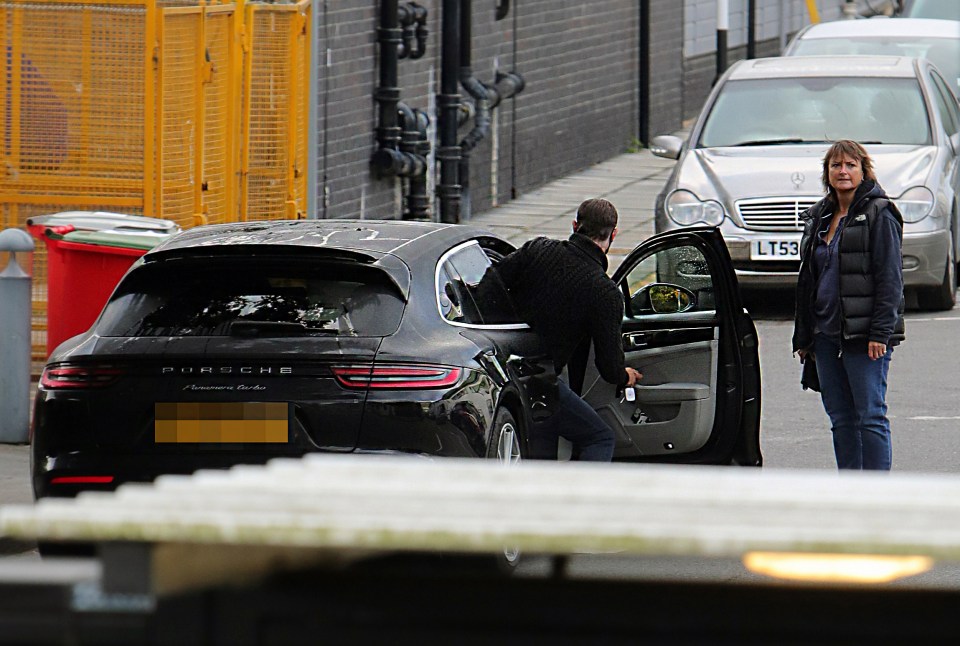 The star stepping out of the car