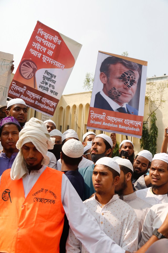 Members of Islamist political party Islami Andolan Bangladesh take part in a march to the French Embassy in Dhaka, Bangladesh