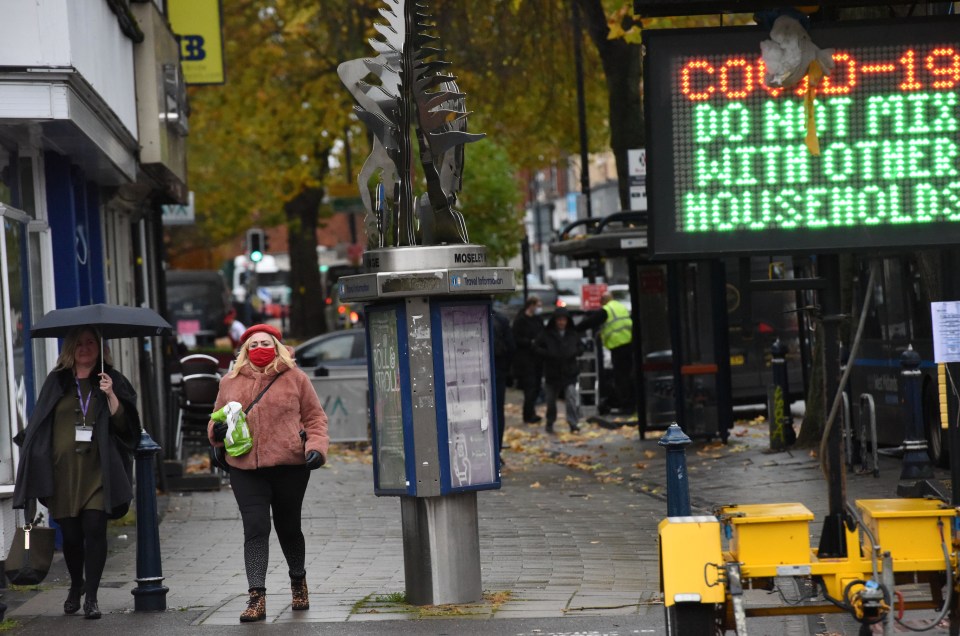 Shoppers in Mosley, Birmingham, are urged not to meet friends or family from other households