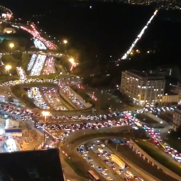 Cars queued up as far as the eye could see as thousands rushed to leave