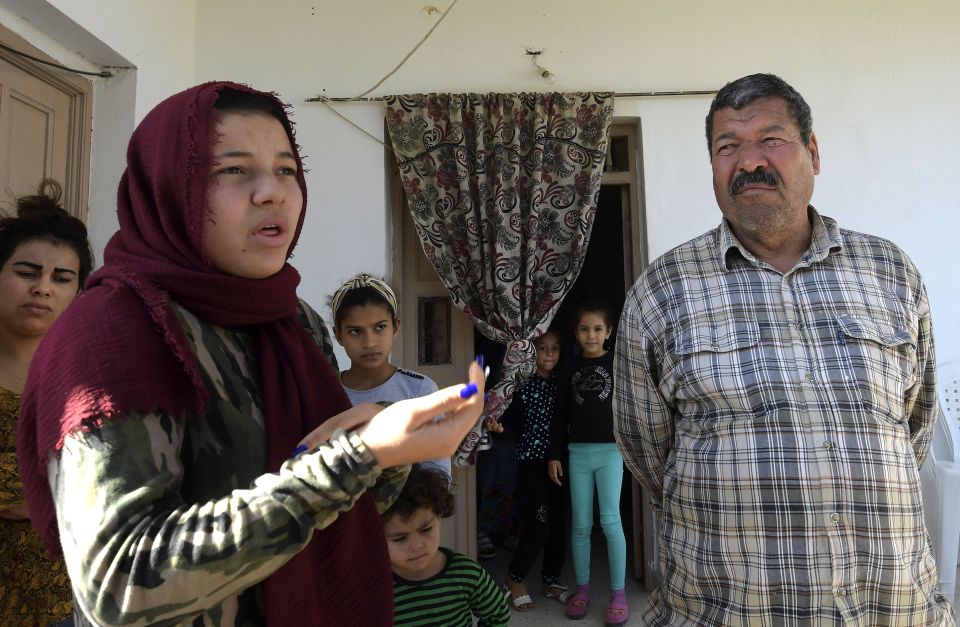 The suspect attacker's sister and father at their home in Tunisia