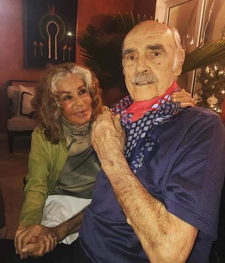 Sir Sean Connery holds his devoted wife's hand as he fights dementia in a poignant final picture of the couple together