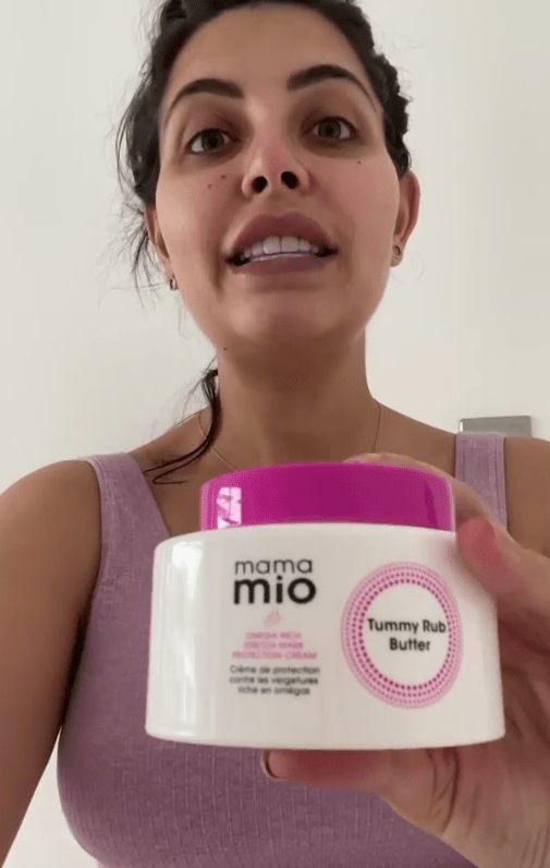 Cara Delahoyde-Massey rubbed cream over her chest as she revealed her favourite mama mio products today