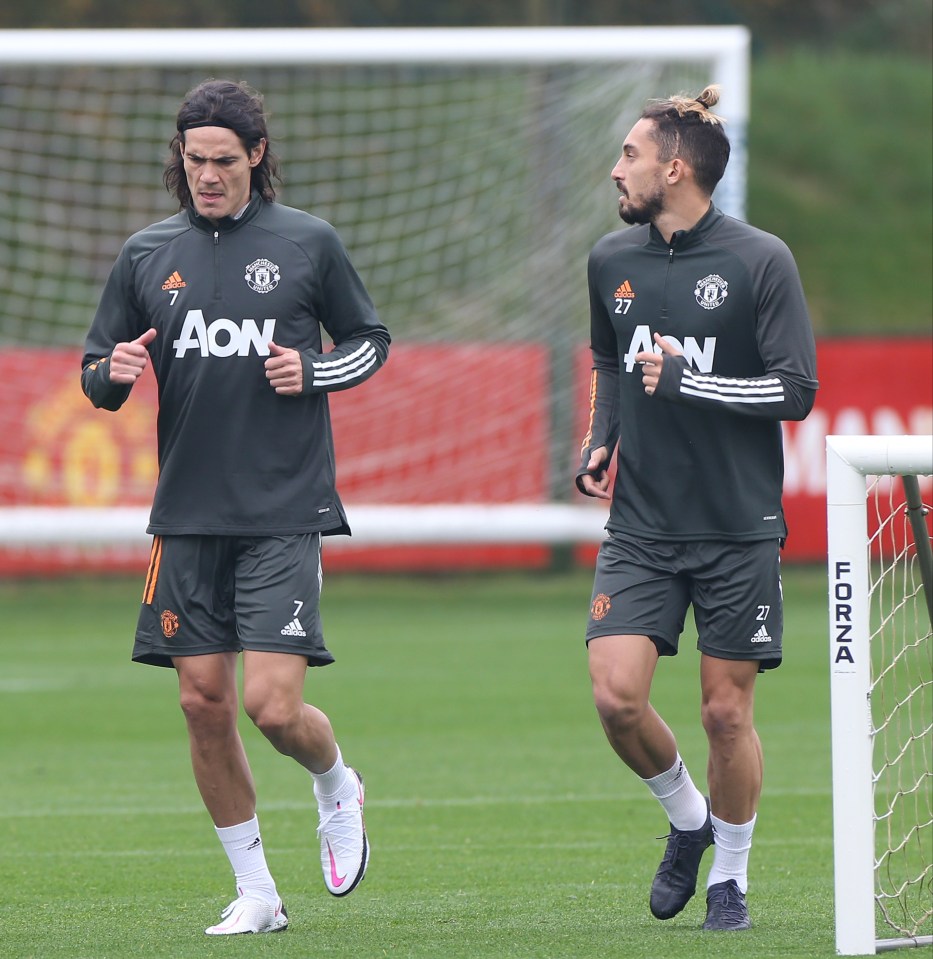 Cavani, jogging with fellow new signing Alex Telles, trained with Man Utd for the first time on Sunday