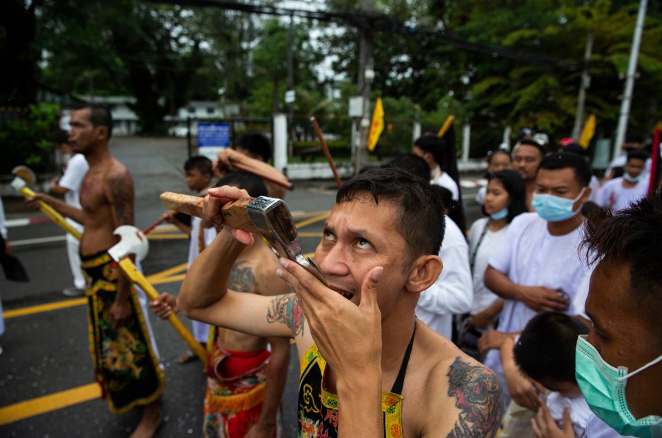 Some cut their tongues with axes as part of the ritual