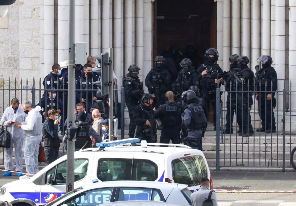 French police's elite RAID unit stands outside Basilica of Notre-Dame in Nice