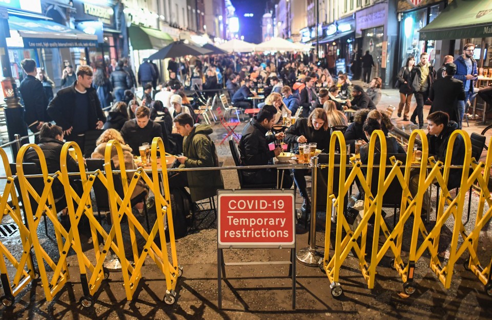 Drinkers in Soho enjoyed pints on Saturday night before pubs and restaurants are forced to shut on Thursday