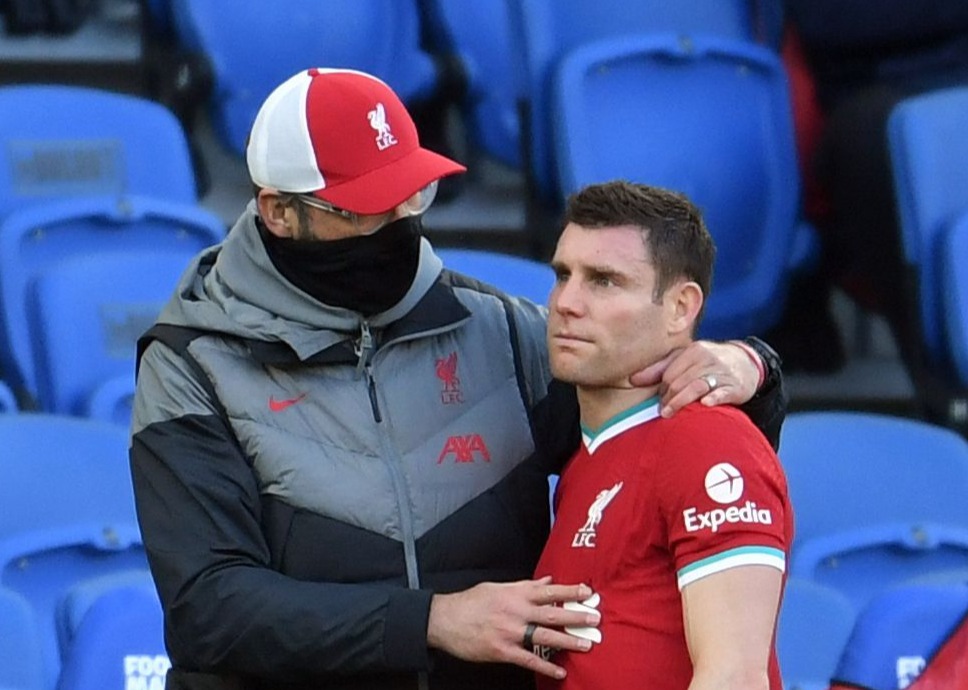 Klopp comforted the midfielder as he headed off the field