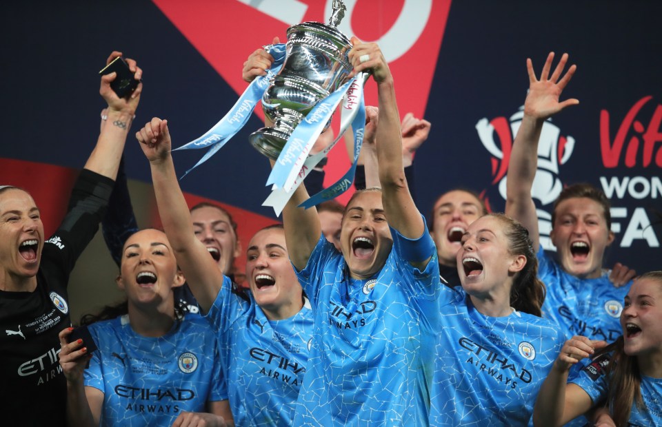 Man City skipper Steph Houghton holds aloft the Women's FA Cup after the 3-1 extra-time success over WSL rivals Everton