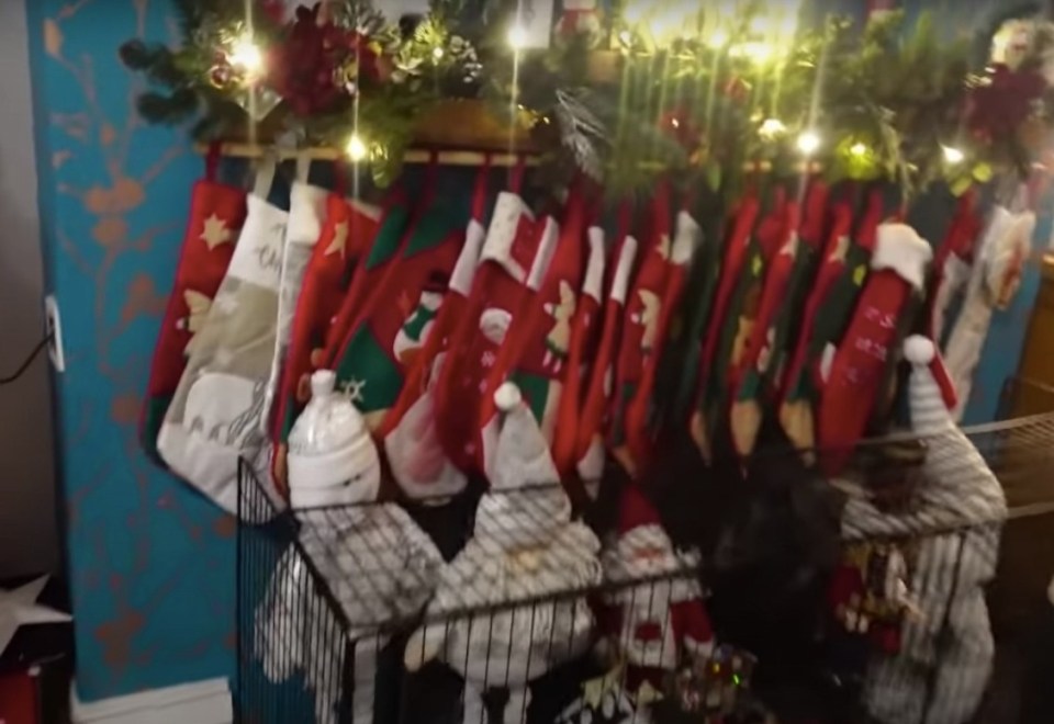 Their are dozens of the family's stockings hung above the fireplace