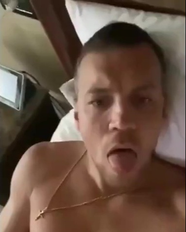 The man, believed to be the Russian skipper, poked his tongue out at the camera