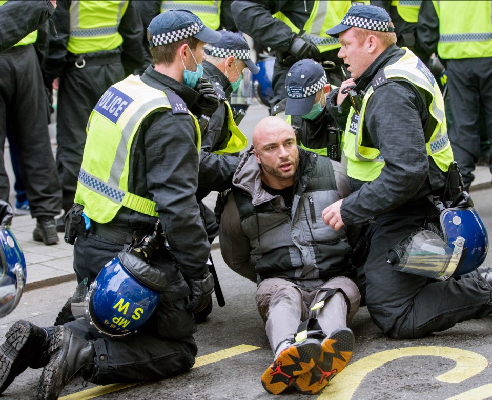 Gym owner Andreas Michli - who refused to close during lockdown - was arrested at the demo