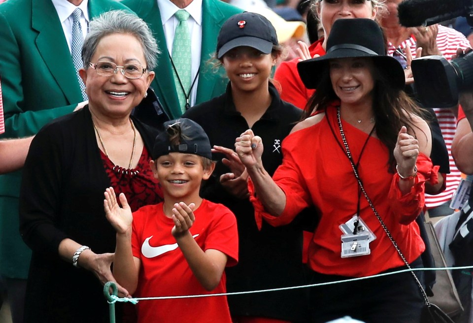 The golfing legend celebrated with son Charlie as he won his FIFTH green jacket at Augusta last year