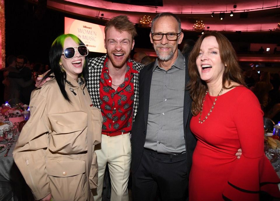 Billie and her brother Finneas with their parents at the Billboard Women In Music 2019