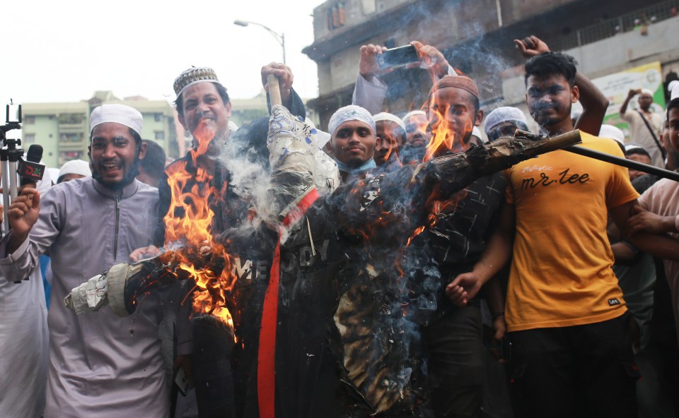 Protesters in countries around the world have burned images of the French leader