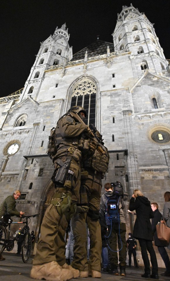 Members of the military patrol outside of St. Stephen’s Cathedral in Vienna, Austria