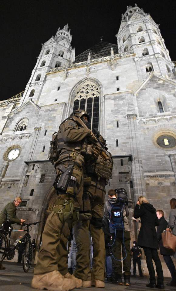 Members of the military patrol outside of St. Stephen's Cathedral in Vienna, Austria