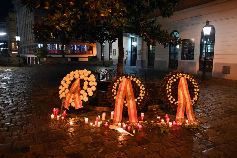 Tributes line the streets in Vienna after the killings on Monday night