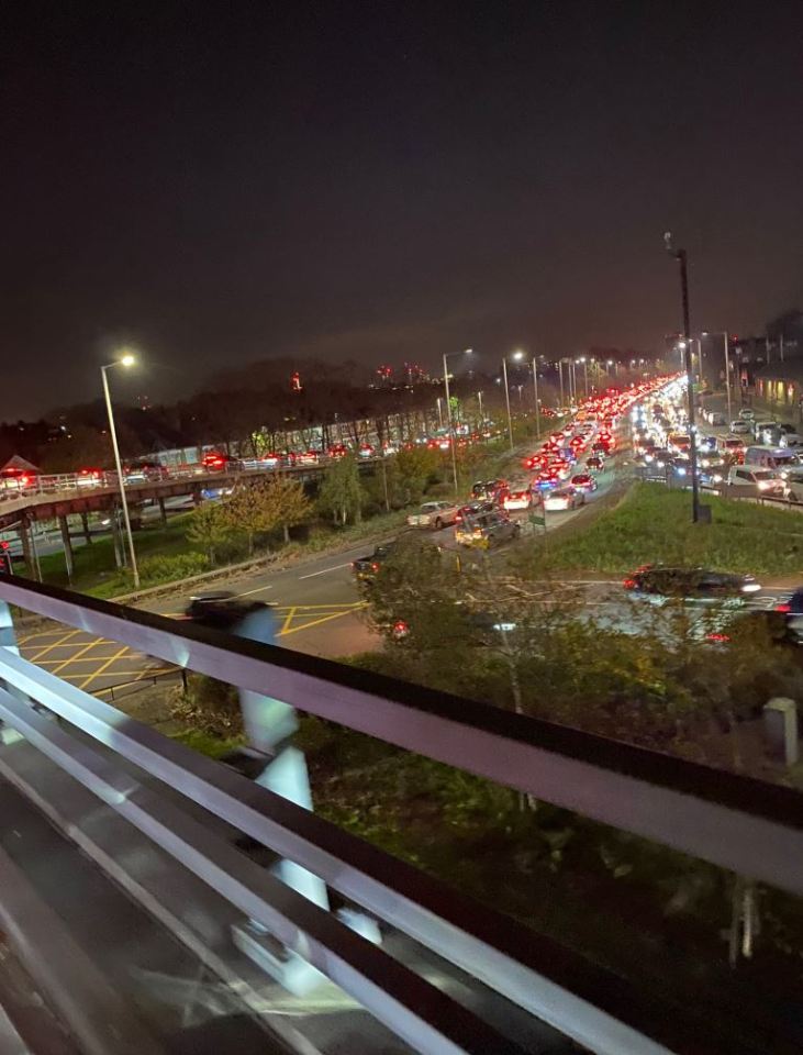 Long queues of traffic were seen in London as Brits made a mad dash to leave before lockdown last night