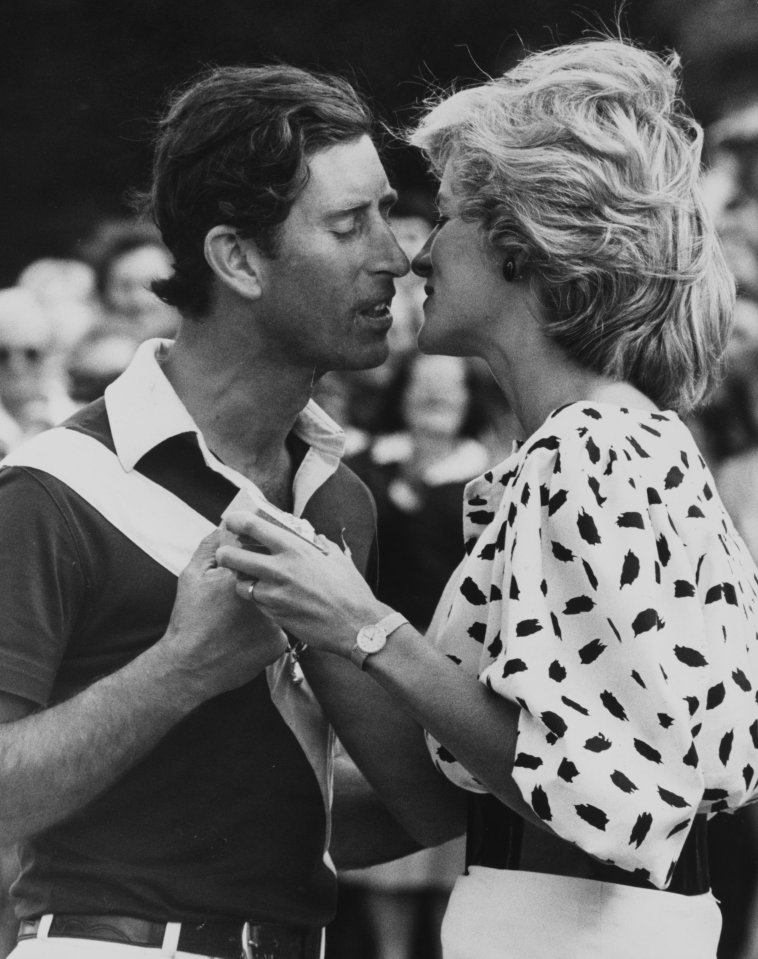 Diana and Charles pucker up for a kiss