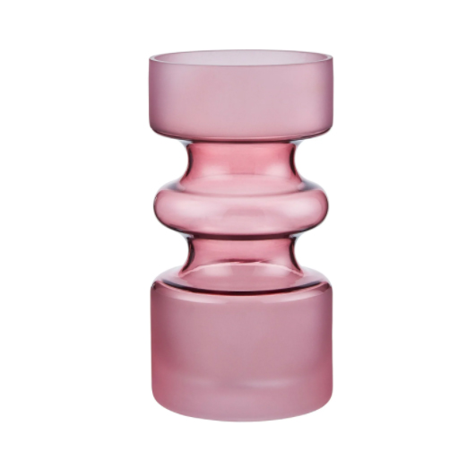 Add statement accessories to liven up your living room - we love this pink vase