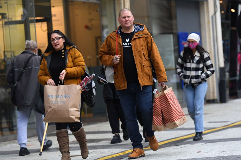 Two delighted shoppers leave Primark this morning