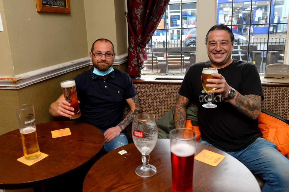 Delighted punters were seen enjoying drinks as pubs reopened in Wales today