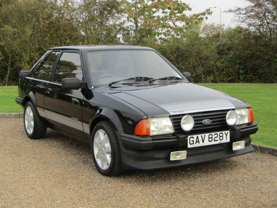 A vintage 1983 Ford Escort has sold for £31,320