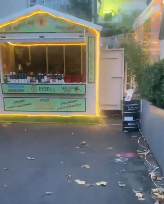 The white phone cord leads straight to the outside bar