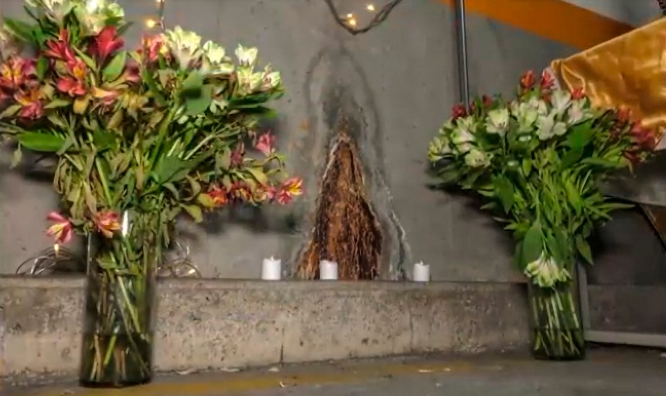 Locals attend the makeshift shrine to pray for protection from the coronavirus