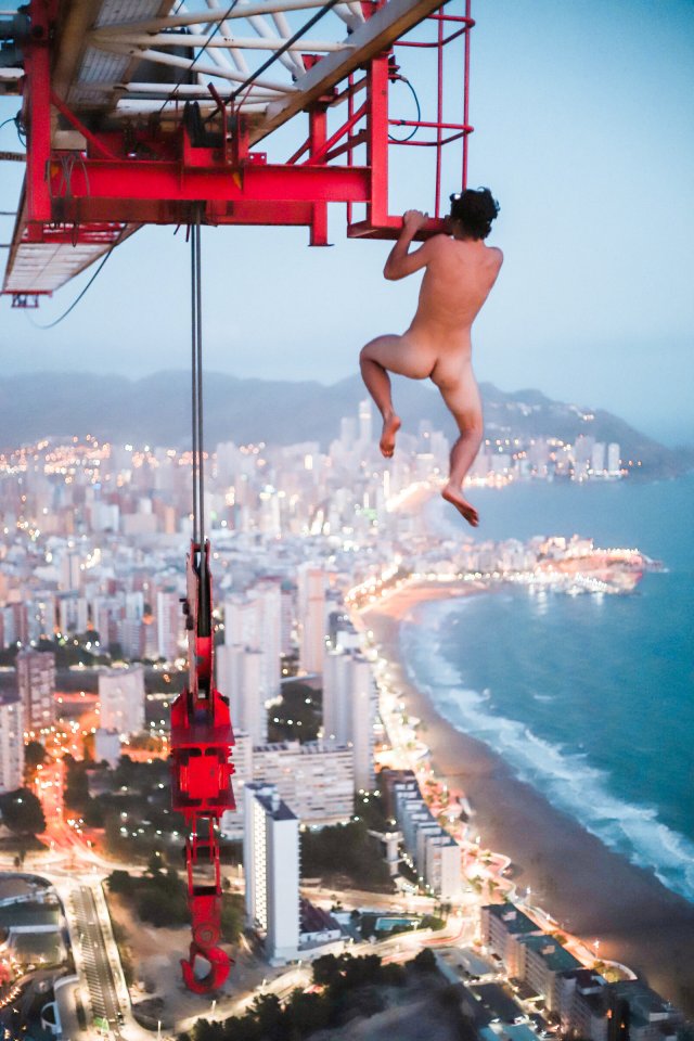 Adam Lockwood showed off his remarkable strength as he hung naked in mid-air