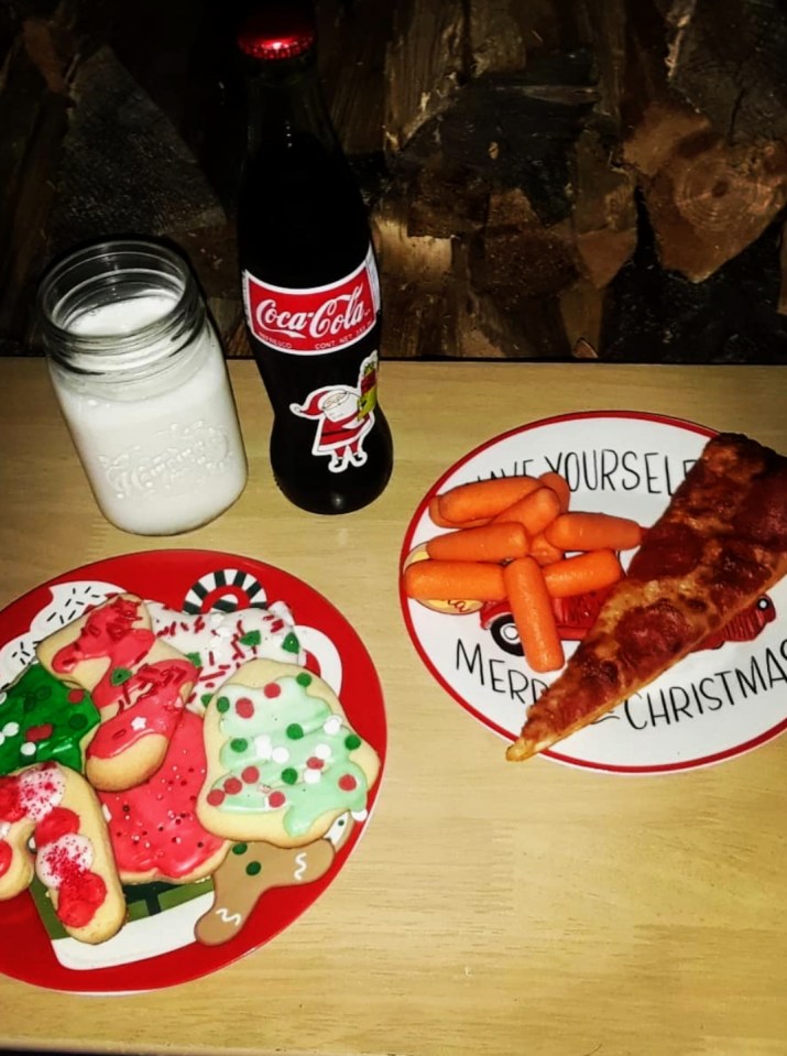 The family leave Santa Pizza and Coca Cola on Christmas Eve