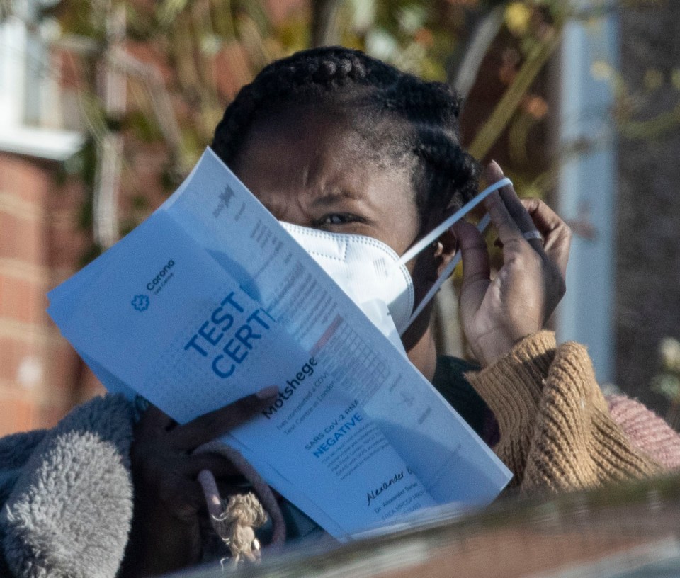 Motsi appeared to be holding a negative coronavirus test certificate as she boarded her flight to Germany