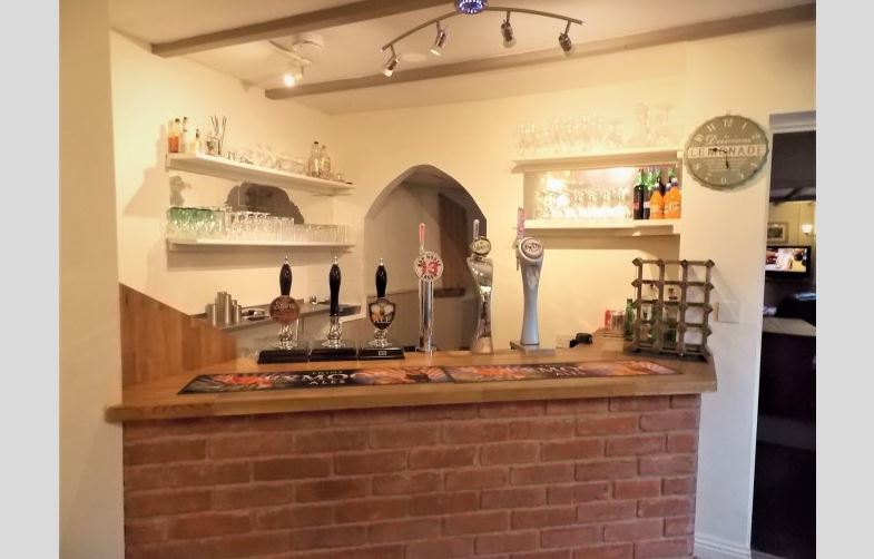 Inside is a fully working bar, with a beer tap running